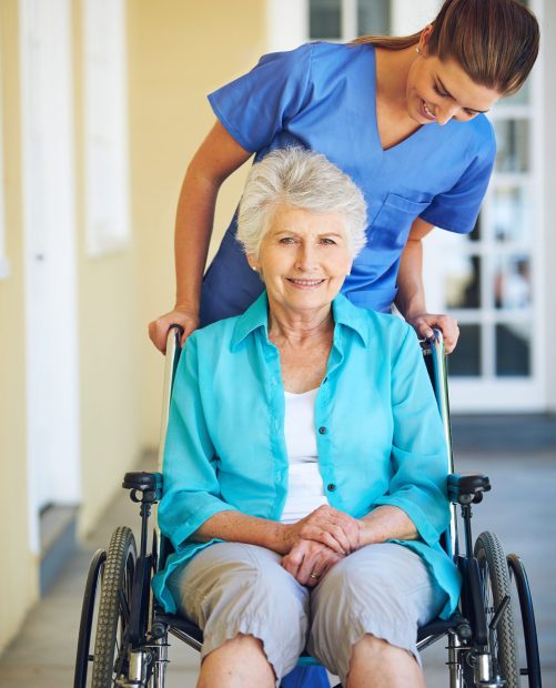 Portrait,,Caregiver,Or,Happy,Old,Woman,In,Wheelchair,In,Hospital